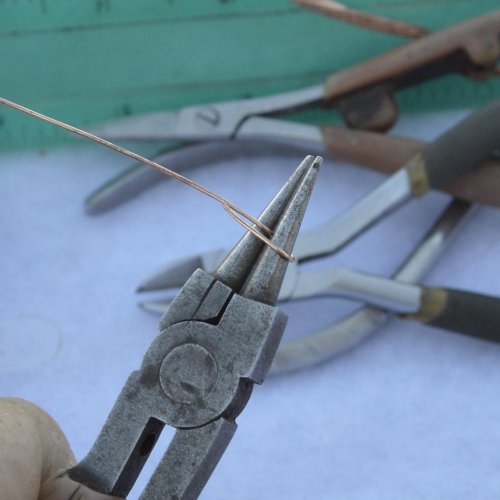 Deborah Kelly's Wire Wrapped Beaded Chain - , Contemporary Wire Jewelry, Loops, Wire Loop, Wrapped Wire Loop, Wire Wrapping, Wrapping, Wire Wrapping Jewelry, Bend the tail of the wire around the round nose pliers.    